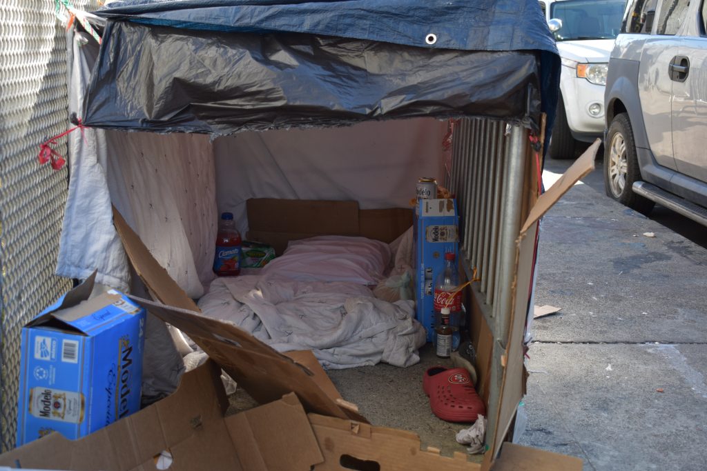 Inside a tent left by an unhoused man on Stevenson and 14th Street in San Francisco. The area smelled of human waste and leftover alcohol. Photo by Magaly Muñoz.