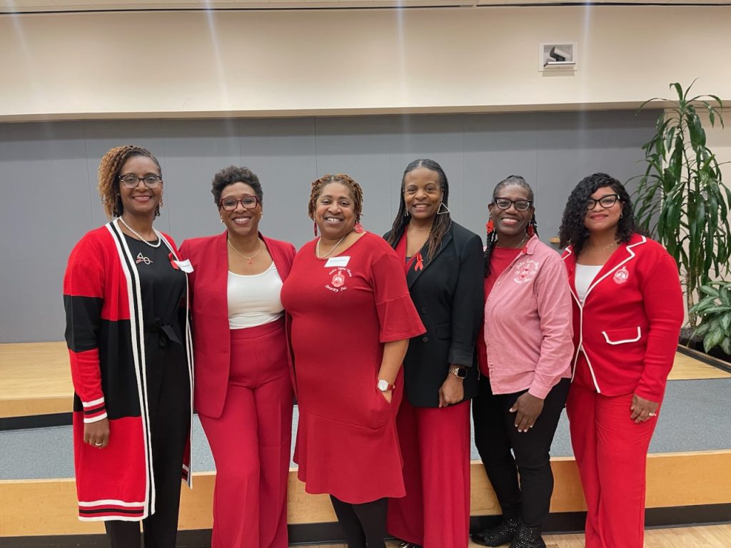 L-R Petrina A. Perteet, Dr. Natalie Wilson, Don-Neva Johnson, Tracy Diop, Sonji Walker and Takija Gardner were part of the World AIDS Day event. Photo by Kevin Hicks.