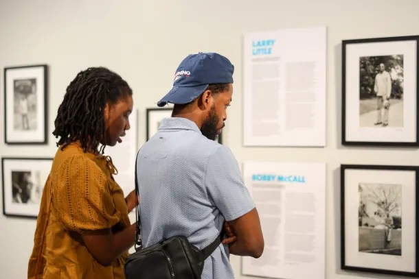 Visitors take in the exhibit during “By the People, For the People: A Black Panther Party Celebration.” Douglas Carter, OBSERVER